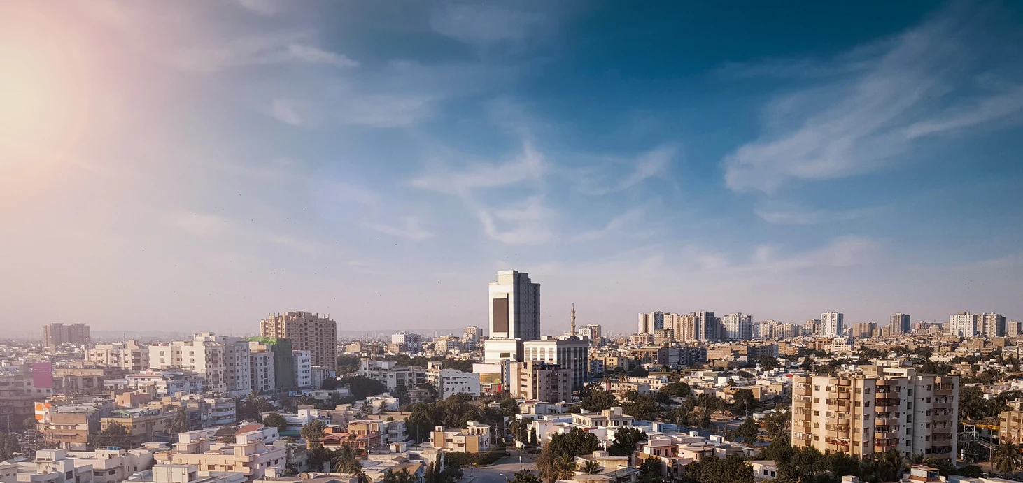 Karachi skyline under a clear blue sky